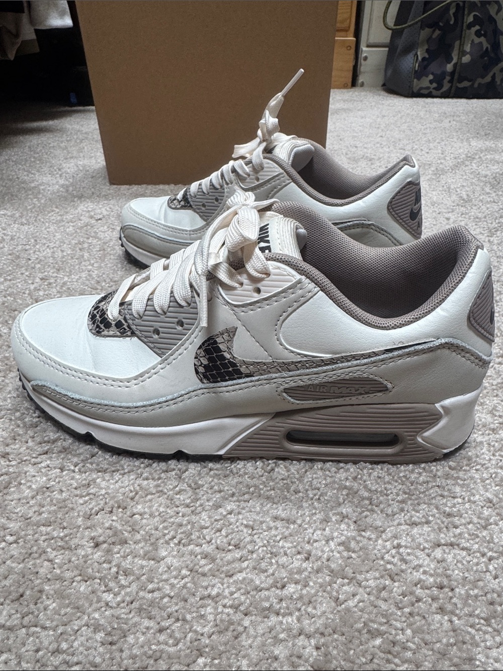 Nike Women’s Sneakers in White with Taupe & Snake-Print Swoosh